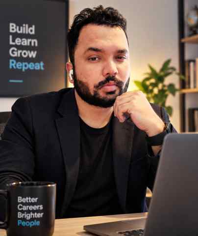 Rajiv Buda in a professional workspace